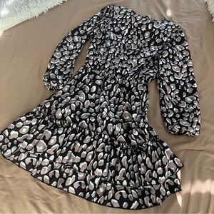 Elegant Black and Cream Patterned Dress